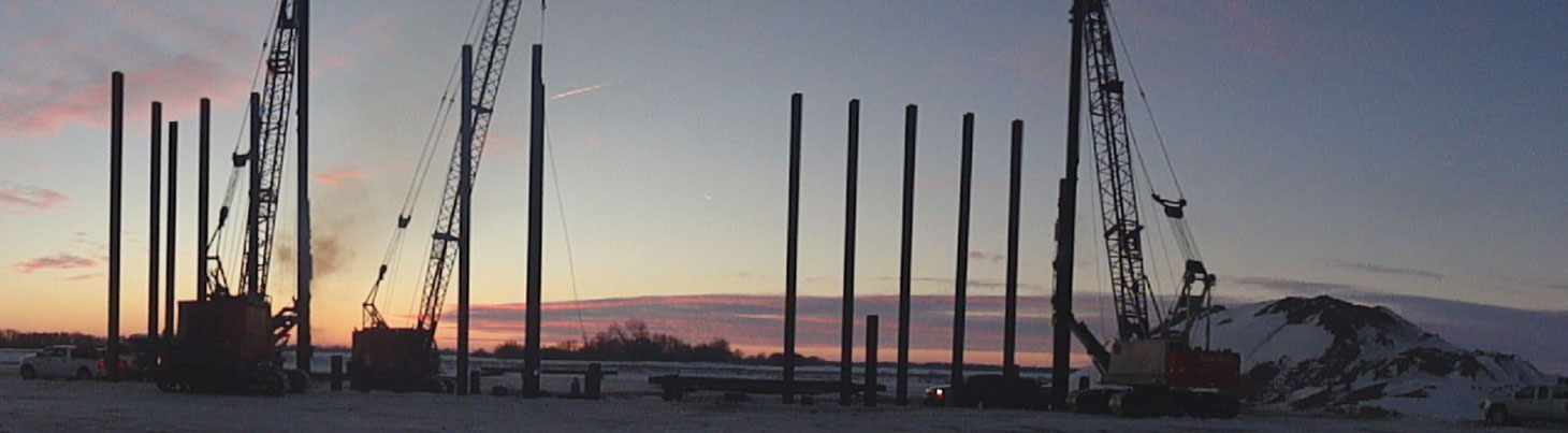 Piles with sun setting in background