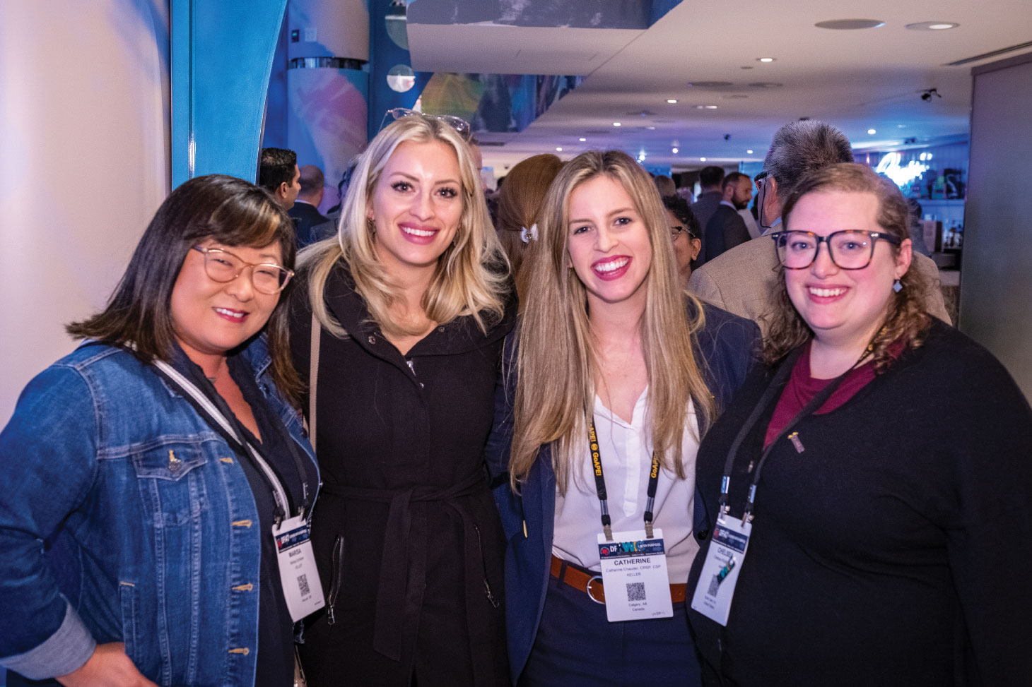 Catherine Chauder posing for photo with three industry colleagues