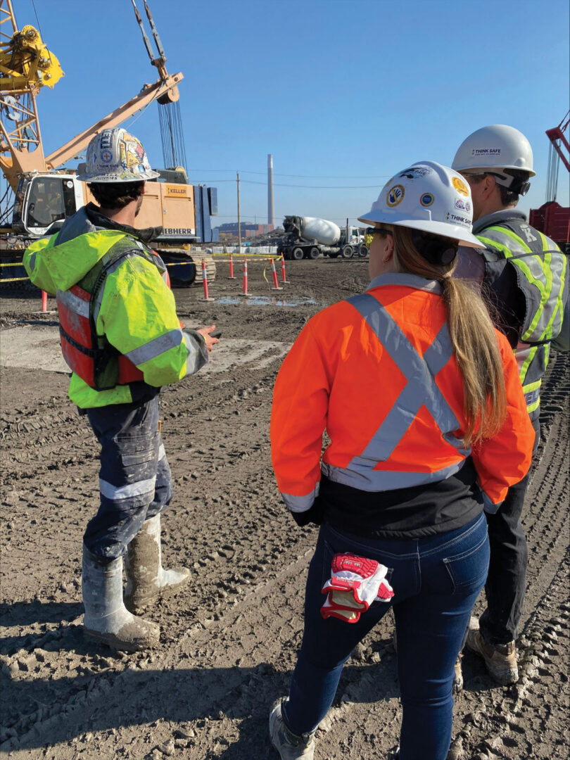 Keller employees in safety equipment on job site