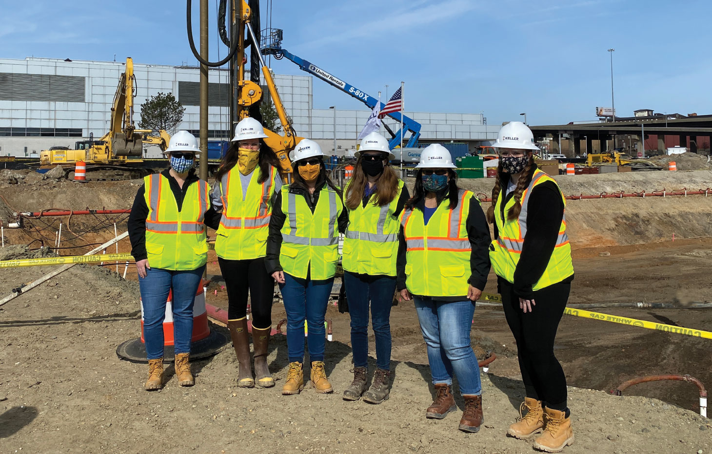 Group of Keller employees in safety equipment posing for photo