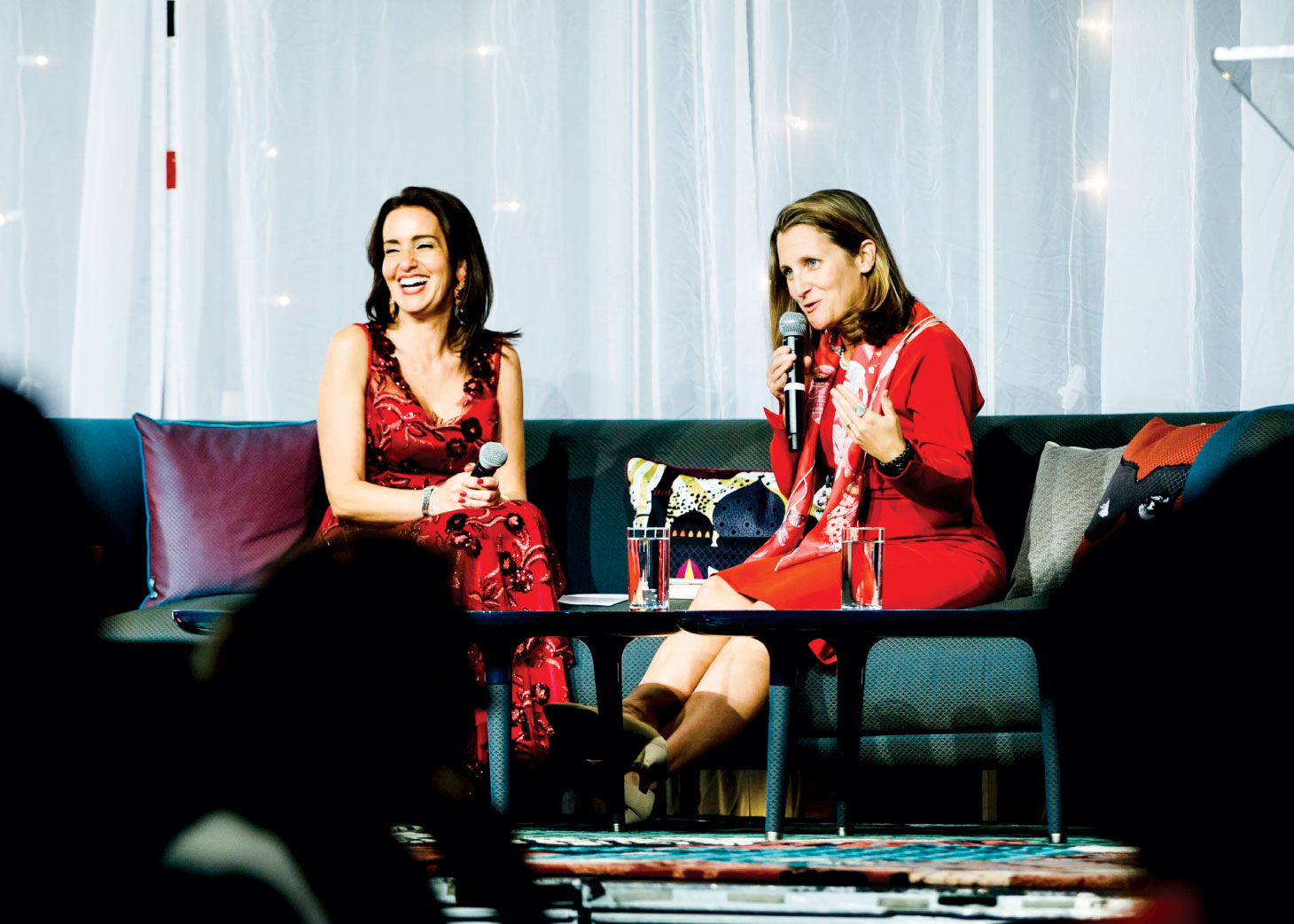 Chrystia Freeland sitting with Caroline Codsi on couch