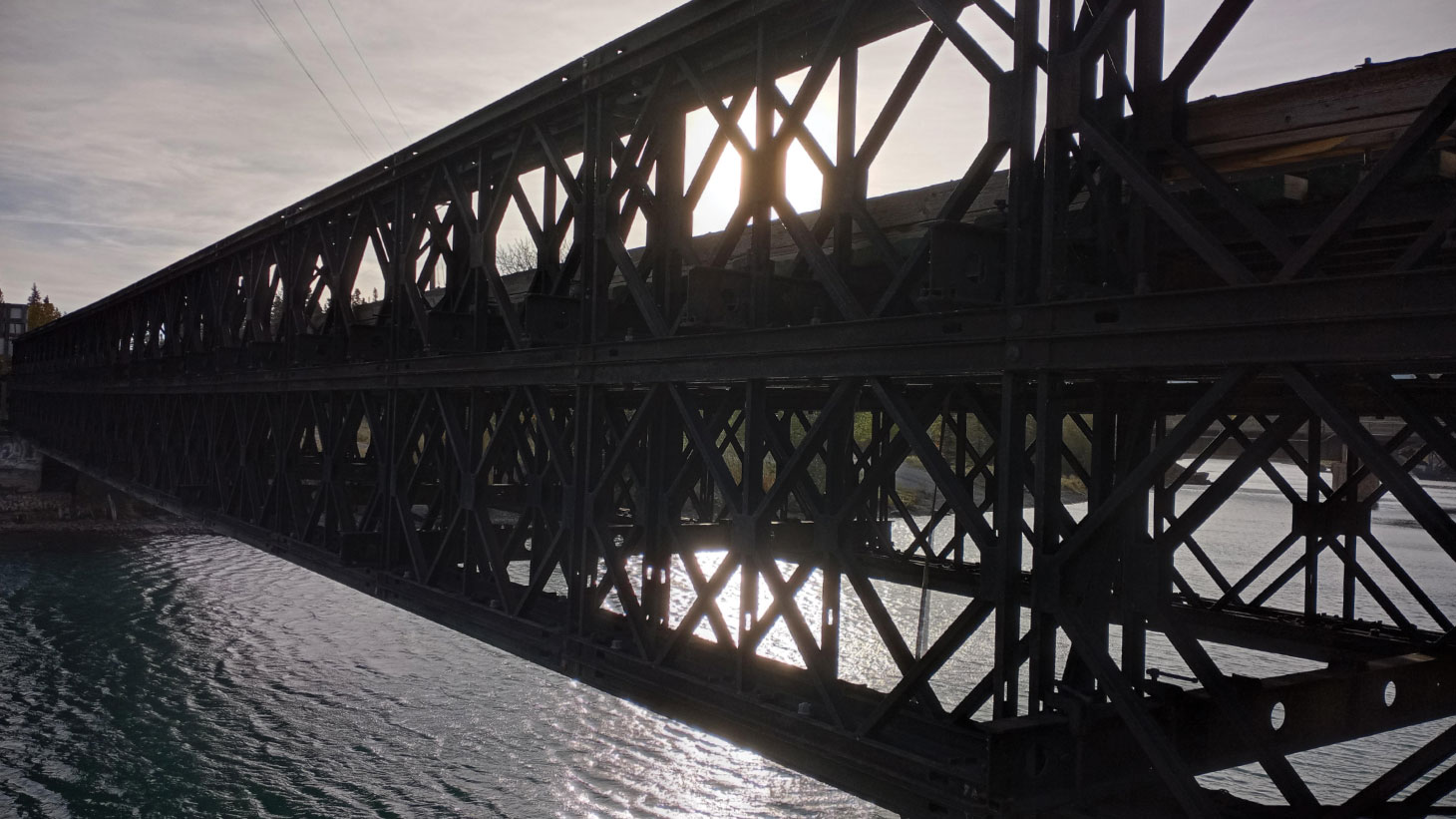 Bridge over water at dusk