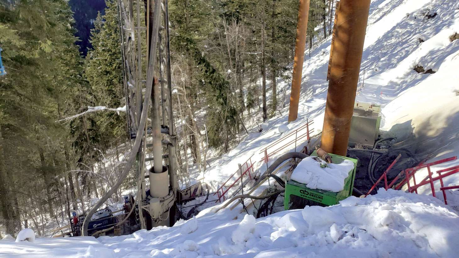 Equipment partially-covered in snow